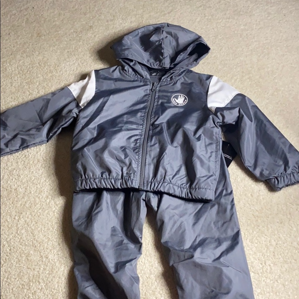 2 piece boys lightweight jacket and pants set.